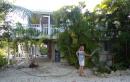 Kathy watering her yard in the Florida Keys